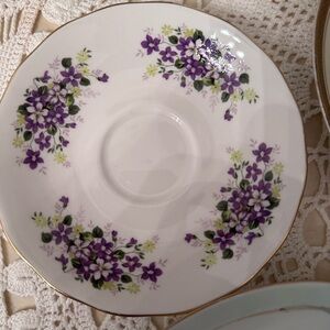 Floral Porcelain Queen Anne Saucer with Purple Accents